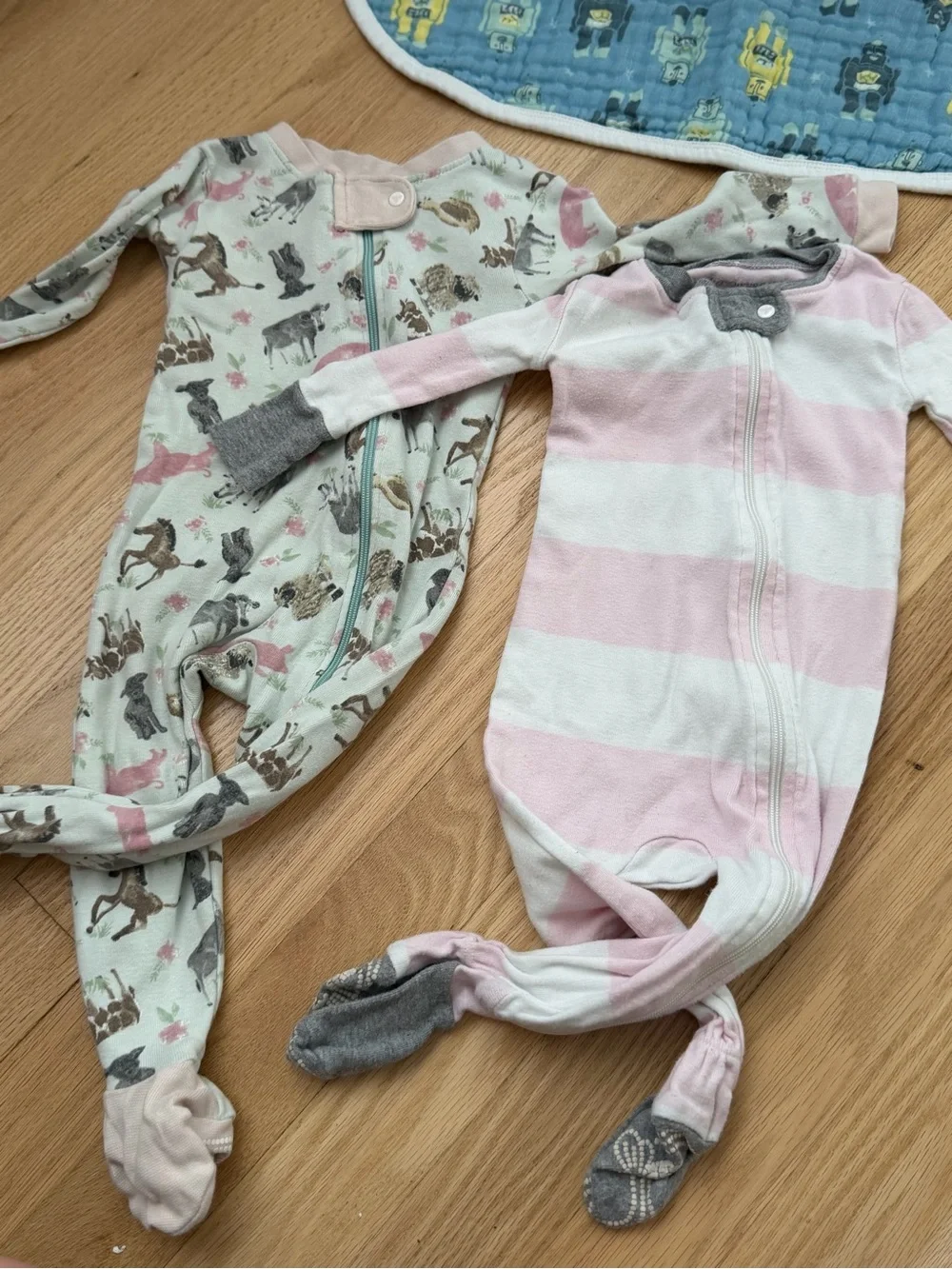 Bundle of two Burt’s Bees Baby organic cotton footie sleeper pajamas size 6-9m